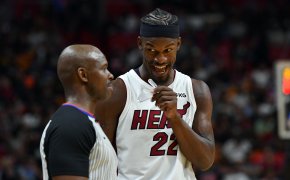 Jimmy Butler, Miami Heat, discusses with official