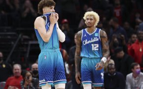 LaMelo Ball wiping face with jersey