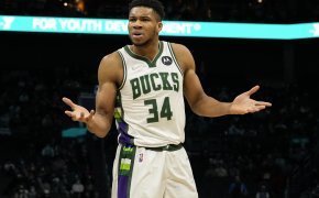 Giannis Antetokounmpo hands out