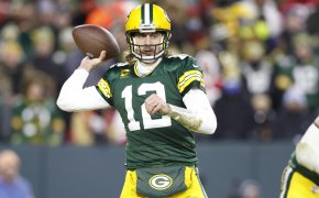 Green Bay Packers quarterback Aaron Rodgers prepares to throw the ball