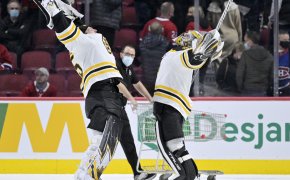 Boston Bruins goaltenders Linus Ullmark and Jeremy Swayman celebrating a win