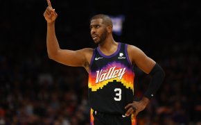 Chris Paul signals during a stoppage