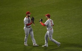 Los Angeles Angels first baseman Jared Walsh celebrates with right fielder Taylor Ward