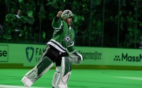 Dallas Stars goaltender Jake Oettinger saluting the crowd after a win