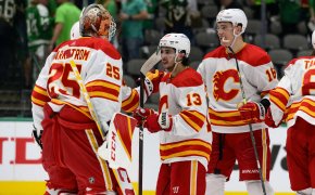 Calgary Flames players celebrating a win over Dallas