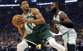 Giannis Antetokounmpo defended by Jaylen Brown