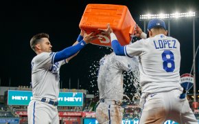 Kansas City Royals Whit Merrifield and Nicky Lopez dumping water on Bobby Witt Jr