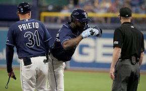 Tampa Bay Rays right fielder Randy Arozarena talking to an umpire