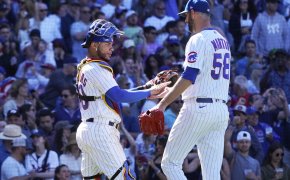 Chicago Cubs catcher Willson Contreras and relief pitcher Chris Martin celebrate a win