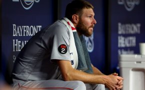 Chris Sale looks on from the bench