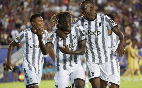 Juventus forward Moise Kean celebrates with teammates after scoring a goal