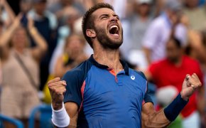 Borna Coric celebrates after winning the Western & Southern Open
