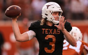 Quinn Ewers, a candidate in the Heisman odds, throws the football in practice
