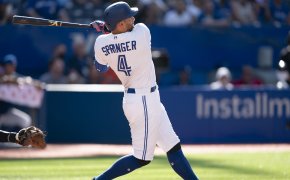 Toronto Blue Jays center fielder George Springer hitting a homer