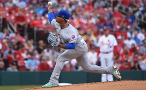 Chicago Cubs starting pitcher Marcus Stroman delivering a pitch to home plate