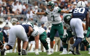 Ohio Bobcats quarterback Kurtis Rourke signals from the line of scrimmage