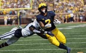 Michigan Wolverines running back Blake Corum rushes with the football