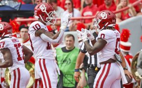 Oklahoma Sooners running back Eric Gray celebrates with wide receiver Theo Wease