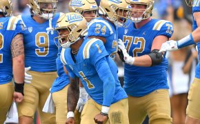UCLA Bruins quarterback Dorian Thompson-Robinson celebrates with running back Zach Charbonnet in the end zone