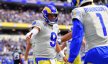 Los Angeles Rams quarterback Matthew Stafford celebrates the touchdown scored by wide receiver Allen Robinson II