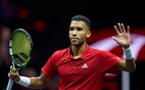 Felix Auger-Aliassime waving to the crowd after a Laver Cup match