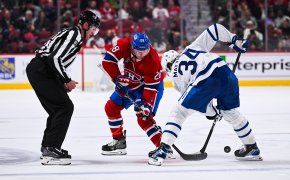 Montreal Canadiens center Christian Dvorak faces off against Toronto Maple Leafs center Auston Matthews