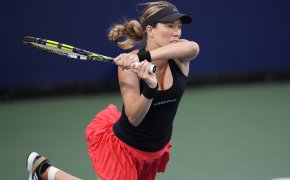 Danielle Collins hitting a shot during a tennis match at the San Diego Open.