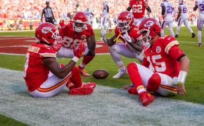 Kansas City Chiefs wide receiver JuJu Smith-Schuster and quarterback Patrick Mahomes and tight end Jody Fortson and running back Jerick McKinnon celebrate in the end zone