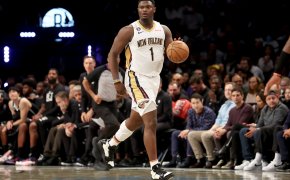 New Orleans Pelicans forward Zion Williamson dribbling up the court