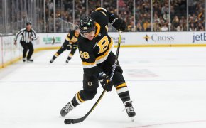 Boston Bruins right wing David Pastrnak shoots the puck during the first period