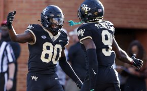 Wake Forest Demon Deacons wide receiver A.T. Perry and wide receiver Jahmal Banks celebrate a touchdown