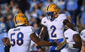 Pittsburgh Panthers running back Israel Abanikanda celebrates with offensive lineman Terrence Moore