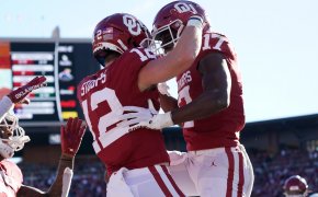 Oklahoma Sooners wide receiver Drake Stoops celebrates with wide receiver Marvin Mims after scoring a touchdown