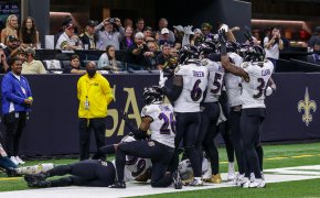 Ravens defenders celebrate