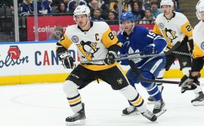 Pittsburgh Penguins center Sidney Crosby battles with Toronto Maple Leafs center Calle Jarnkrok