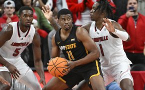 Appalachian State Mountaineers forward Donovan Gregory posts up a defender