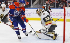 Edmonton Oilers forward Connor McDavid makes a shot on Vegas Golden Knights goalie Adin Hill