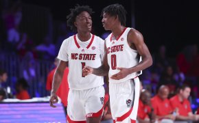 North Carolina State Wolfpack guards Jarkel Joiner and Terquavion Smith talking on the court
