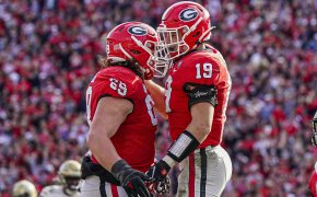 Georgia Bulldogs tight end Brock Bowers celebrates a TD with offensive lineman Tate Ratledge