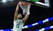 Boston Celtics forward Jayson Tatum dunking