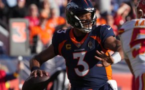 Broncos quarterback Russell Wilson prepares to pass the ball