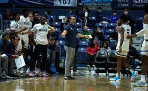 URI coach Archie Miller gesturing to his players