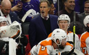 Philadelphia Flyers head coach John Tortorella talks to his team