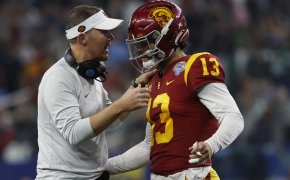 USC Trojans head coach Lincoln Riley talks to quarterback Caleb Williams