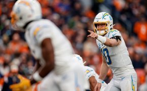 Los Angeles Chargers quarterback Justin Herbert gestures at the line of scrimmage