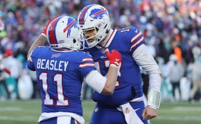 Bills quarterback Josh Allen celebrates with Cole Beasley