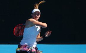 Elena Rybakina hitting a forehand shot during a tennis match at the Australian Open.