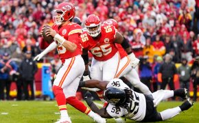 Patrick Mahomes tries to avoid the tackle
