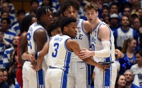 Duke players huddle on court