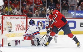 Washington Capitals left wing Alex Ovechkin deflects a shot on New York Rangers goaltender Jaroslav Halak